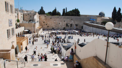 The Wailing wall, with the Dome of the Rock peeping over top right
